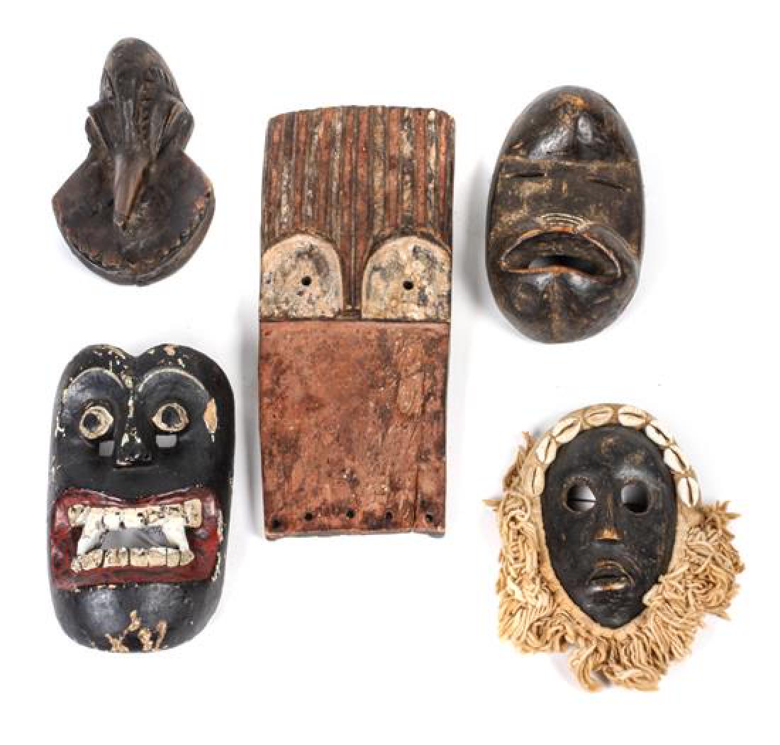 Five Decorative Carved Wood Masks Height of largest 10 (1 of 1)