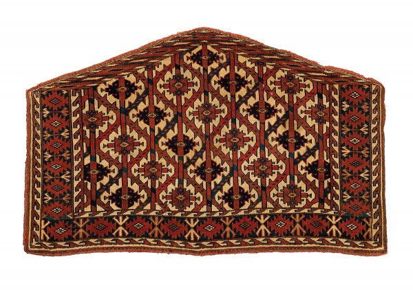 Yomud Turkoman asmalyk, west turkestan, 19th cent: Yomud Turkoman asmalyk west turkestan, 19th century 2 ft. 5 in. x 3 ft. 11 in. For similar examples of lattice design Yomud asmalyks with ashik borders, see Louise Mackie and John Thompson, Turkmen Tr