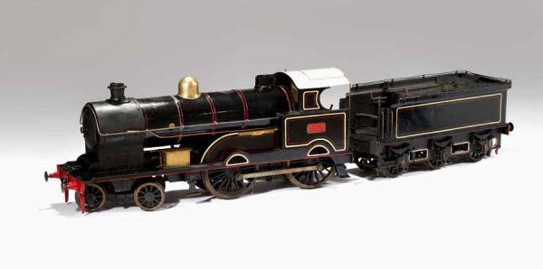 Painted steel and brass miniature Locomotive and T: Painted steel and brass miniature Locomotive and Tender bassett lowke ltd, north hampton, england, early20th century Metal plate inscribed George the Fifth" overall L: 82 in. "