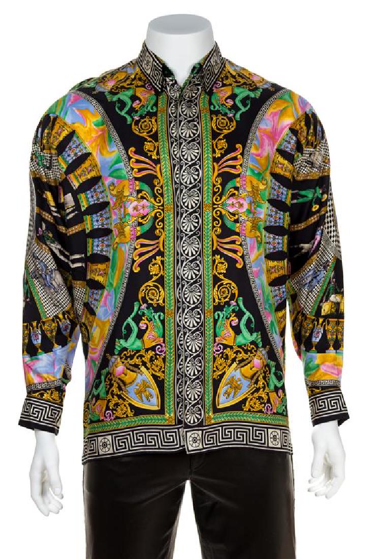 A Gianni Versace Silk Print Shirt, Size 48.: A Gianni Versace Silk Print Shirt, 1992, with an urn print, decorative black faceted buttons at the top neck closure and cuffs and hidden right side button closure. Labeled: Gianni Versace. Size 48. E