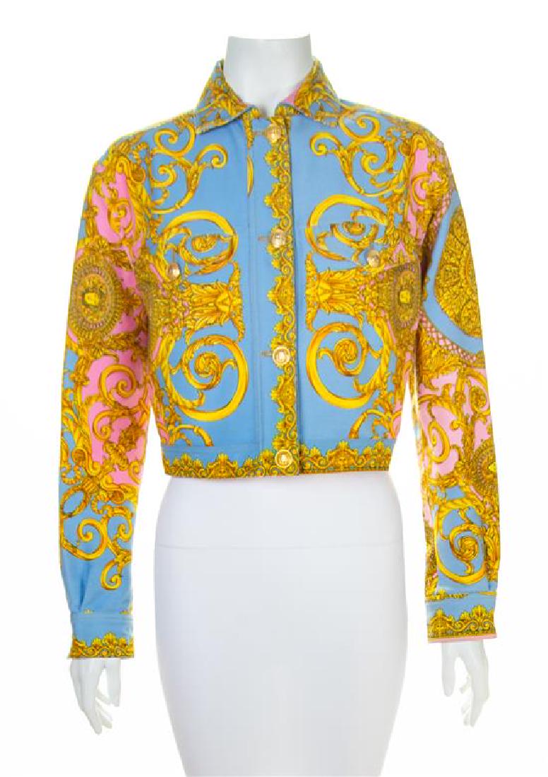 A Gianni Versace Cotton Atelier Print Jacket, No size.: A Gianni Versace Cotton Atelier Print Jacket, Spring/Summer 1992, with a baroque and Medusa print, flap chest pockets with decorative goldtone Medusa buttons and front button closure. Design featured