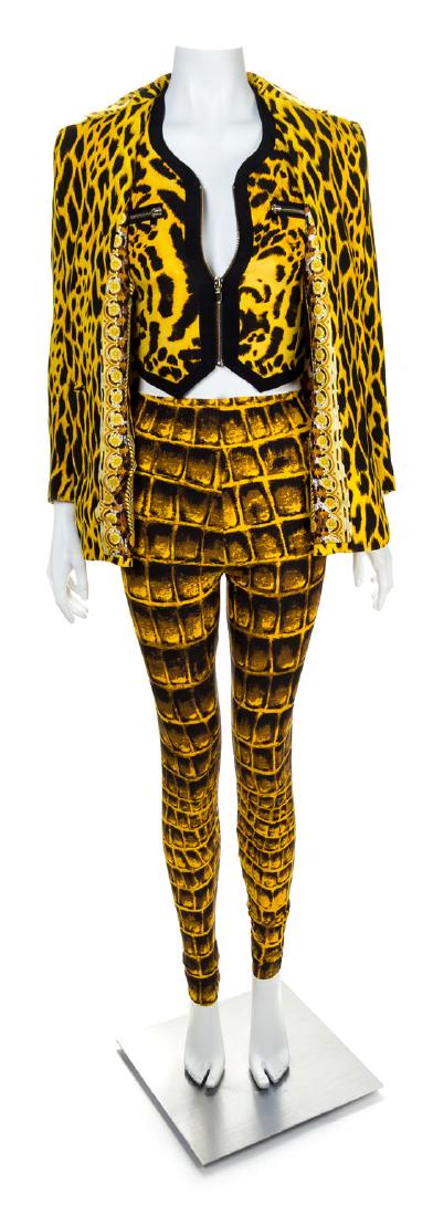A Gianni Versace Animal Print Ensemble, Jacket and vest: A Gianni Versace Animal Print Ensemble, Spring/Summer 1992, comprised of a silk jacket with a notched collar, front flap hip pockets with decorative goldtone buttons with amber rhinestone starfish emb