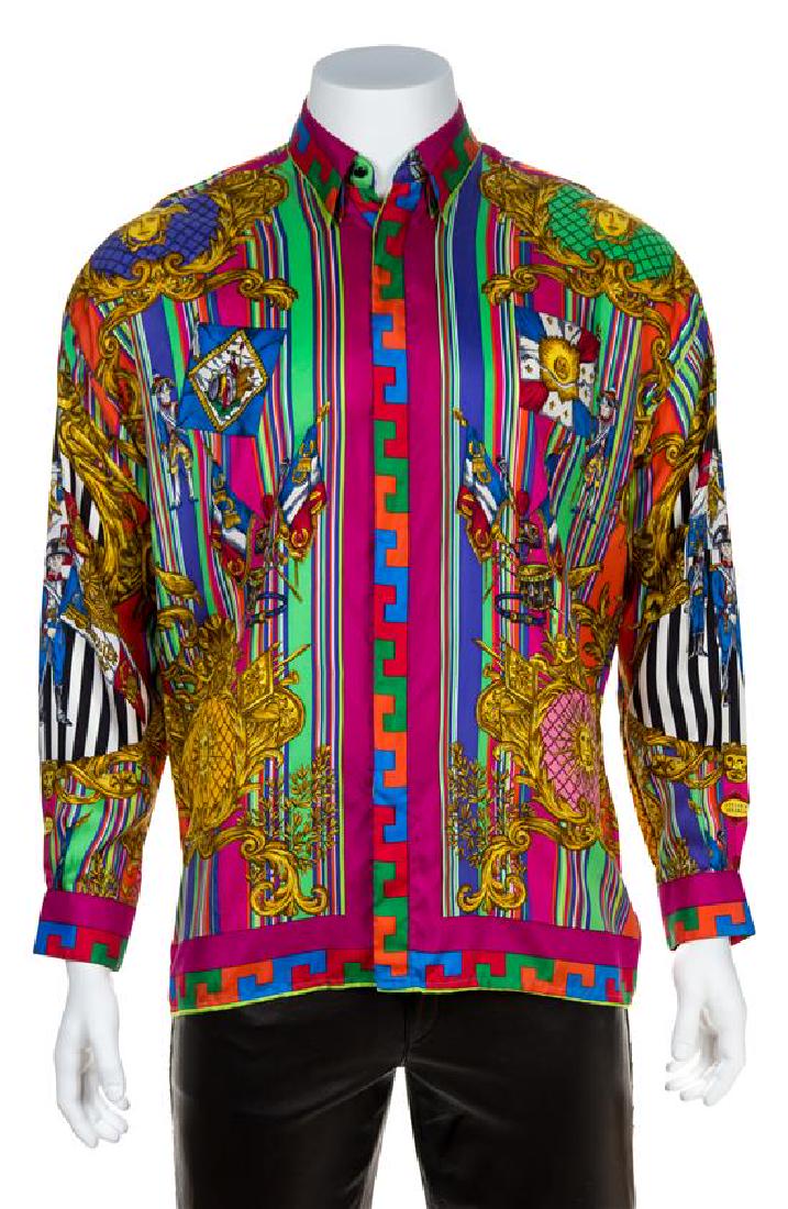 A Gianni Versace Silk Atelier Print Shirt, Size 48.: A Gianni Versace Silk Atelier Print Shirt, 1993, with a French soldier print, decorative black faceted buttons at the top neck and sleeve cuff and left side hidden button closure. Labeled: Gianni Vers