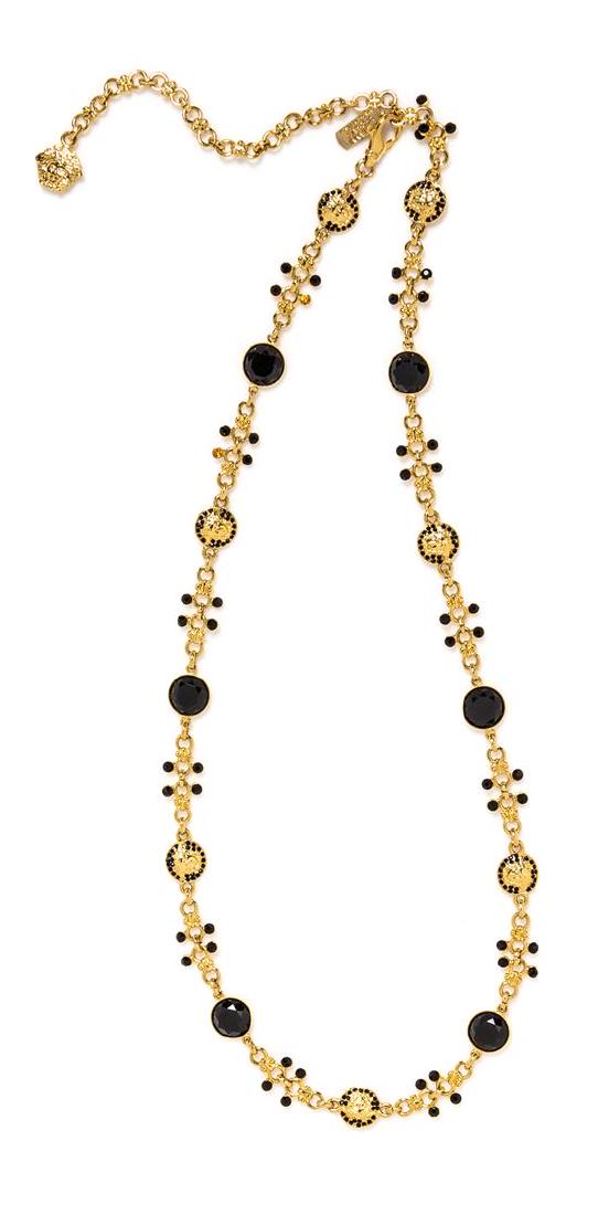 A Gianni Versace Black Rhinestone Medusa Link Belt,: A Gianni Versace Black Rhinestone Medusa Link Belt, 1990s, goldtone with a lobster claw clasp. Stamped: Gianni Versace. Length: 29.5"- 34.5". Estimate $400-600 Property from a Single-Owner Collector o