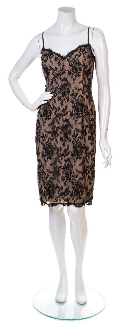 A Bill Blass Black Lace Slip Dress, Size 8.: A Bill Blass Black Lace Slip Dress, with spaghetti straps, a sweetheart neckline, a nude silk underlay and fully lined in black silk. Labeled: Bill Blass. Size 8. Estimate $100-150 Overall very good c