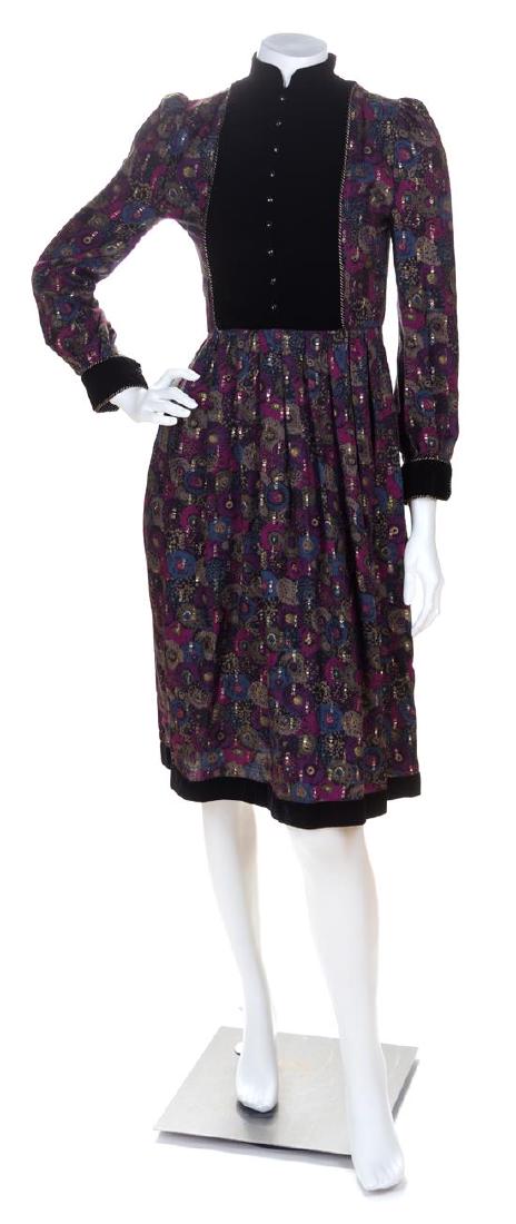 A Nina Ricci Multicolor Floral Dress, Size 36.: A Nina Ricci Multicolor Floral Dress, with a mandarin collar, a black velvet center yolk, black velvet cuffs and hem, a pleated skirt and a back zip closure. Labeled: Nina Ricci "Boutique". Size 36. E