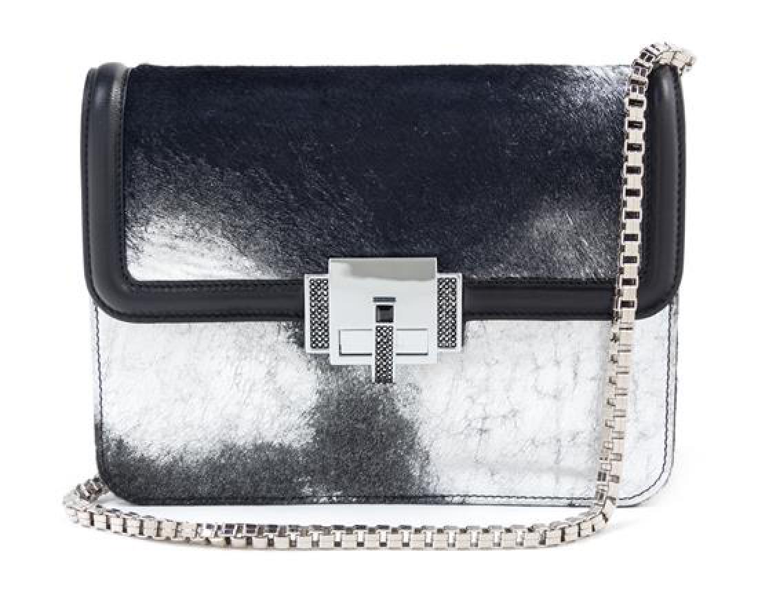 * A Judith Leiber Black and Silver Leather and Calf: * A Judith Leiber Black and Silver Leather and Calf Hair Bag, with silvertone hardware, a detachable silver heavy link strap, a decorative silver and rhinestone front flap turn clasp, two interior com