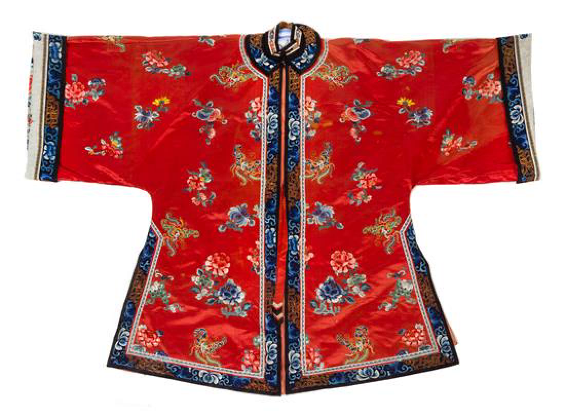 * A Chinese Red Ground Embroidered Silk Lady's Robe and (1 of 2)