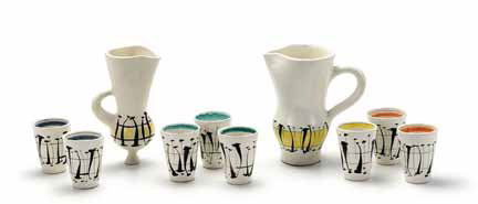ROGER CAPRON, (FRENCH B. 1922), Faience lemonade: ROGER CAPRON (FRENCH B. 1922) Faience lemonade set Circa 1946 for Vallauris Pottery, comprising a pitcher, eight cups and handled vase, each with enameled decoration, the pitcher signed Capron Vallaur