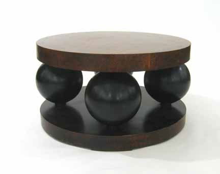 Art Deco style painted coffee table, , After a mo: Art Deco style painted coffee table After a model by Robert Mallet-Stevens (French 1886-1945), the circular top raised on four globe supports and a further circular base. H: 20, Diam: 37 in.
