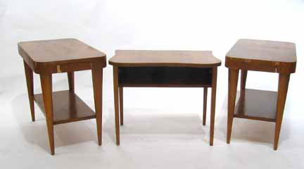 GILBERT ROHDE, (AMERICAN 1894-1944), Three side t: GILBERT ROHDE (AMERICAN 1894-1944) Three side tables 1950s for Herman Miller, a pair of walnut single drawer tables and a serpentine top side table, all retain manufacturer's labels. H: 22 1/4, W: 16,