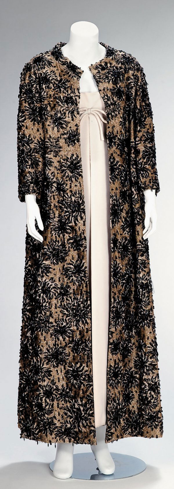 Guy Laroche gold lamé velvet and jet beaded coat: Guy Laroche gold lamé velvet and jet beaded opera coat 1970s Full length three-quarter sleeve coat in heavy metallic flocked fabric wirh large jet beaded starbursts embroidered throughout; open front