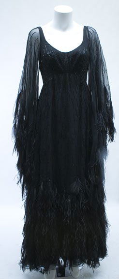 Three chiffon evening gowns, , The first beaded a: Three chiffon evening gowns The first beaded and feathered in solid black by Ruben Panis; one black slip dress in hand-painted abstract pattern and a sheer black cape, ublabeled; and the last from Bon