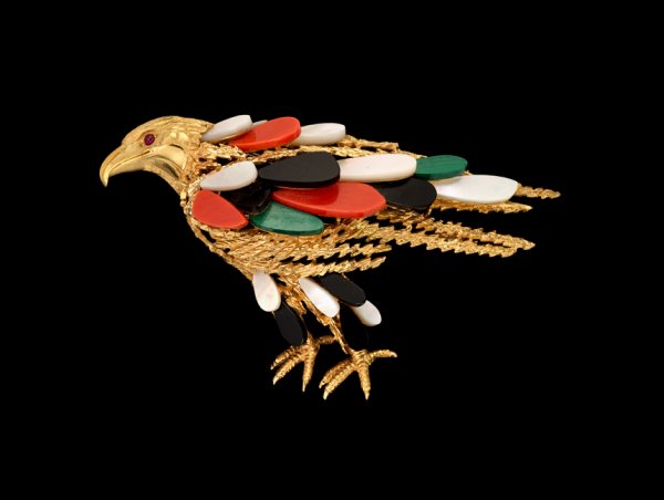 Gold Eagle pin, Van Cleef and Arpels, , Gold eagl: Gold Eagle pin, Van Cleef and Arpels Gold eagle pin, set with mother of pearl, malachite and coral with ruby set eyes. Stamped VCA, France no. L: 3 in.