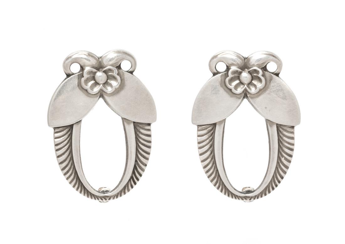 A Pair of Sterling Silver 'Cactus Brooches' Brooches,: A Pair of Sterling Silver 'Cactus Brooches' Brooches, Gundorph Albertus for Georg Jensen, measuring approximately 31.00 x 22.00 mm. Stamp: (George Jensen maker's mark) 227 STERLING DENMARK. 6.60 dwts.