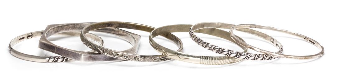 A Collection of Sterling Silver Bangle Bracelets (1 of 1)