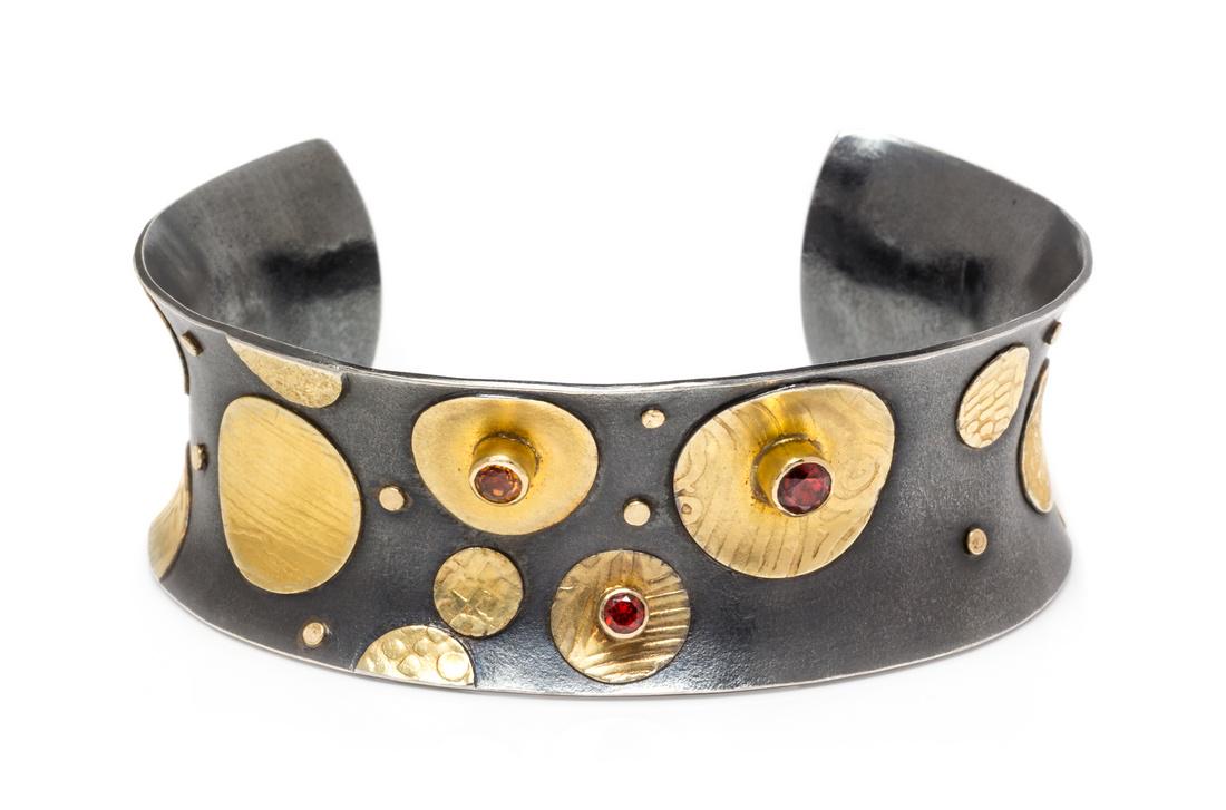 An Oxidized Silver, Yellow Gold and Garnet Cuff (1 of 1)