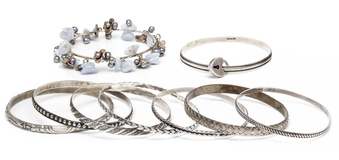A Collection of Sterling Silver Bangle Bracelets (1 of 1)
