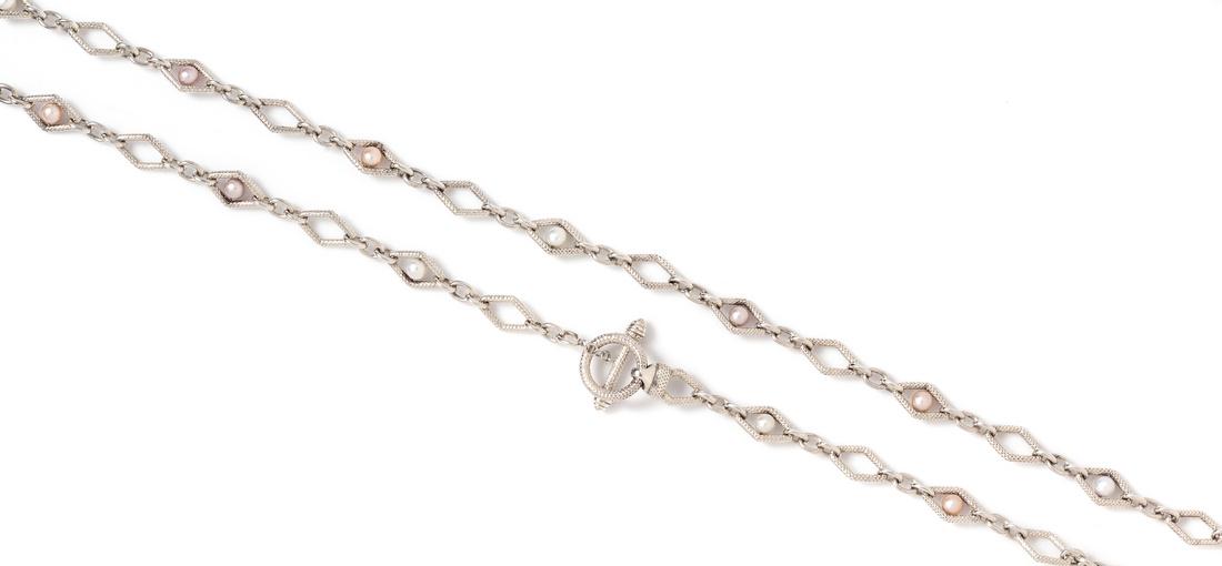 A Sterling Silver and Cultured Pearl Longchain: A Sterling Silver and Cultured Pearl Longchain Necklace, Charles Krypell, consisting of textured navette shaped links joined by polished cables and containing 37 pearls measuring approximately 5.90-6.