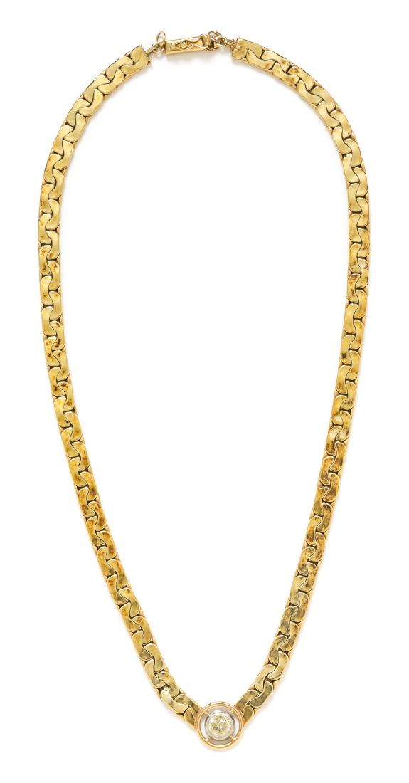 A 14 Karat Yellow Gold, Platinum and Diamond Solitaire (1 of 1)