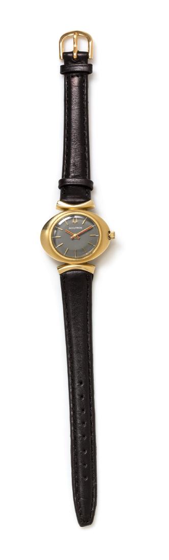 A 14 Karat Yellow Gold 'Accutron' Wristwatch, Bulova,: A 14 Karat Yellow Gold 'Accutron' Wristwatch, Bulova, Circa 1973, 28.00 x 24.00 mm case dimensions excluding lugs, grey dial signed ACCUTRON, applied gold baton numerals, red and gold baton numerals,