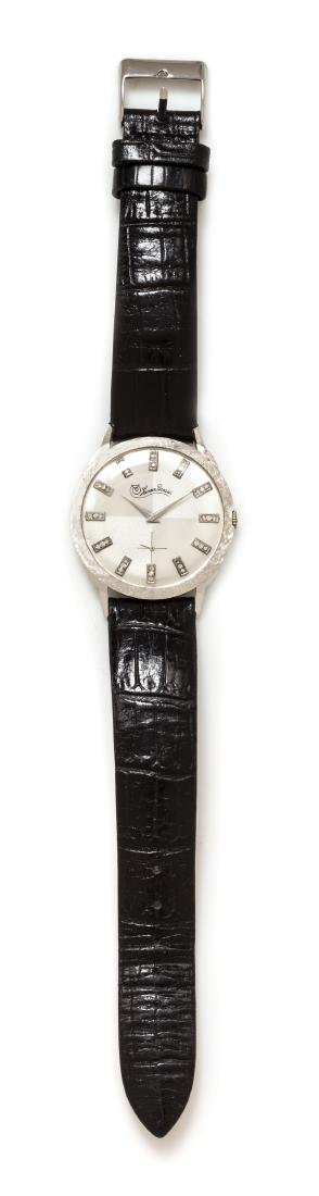 A 14 Karat White Gold and Diamond Wristwatch, Lucien: A 14 Karat White Gold and Diamond Wristwatch, Lucien Piccard, 34.00 mm case diameter, matte silvered dial signed Lucien Piccard, applied diamond numerals, silver pitched dauphine hands, subdial for se