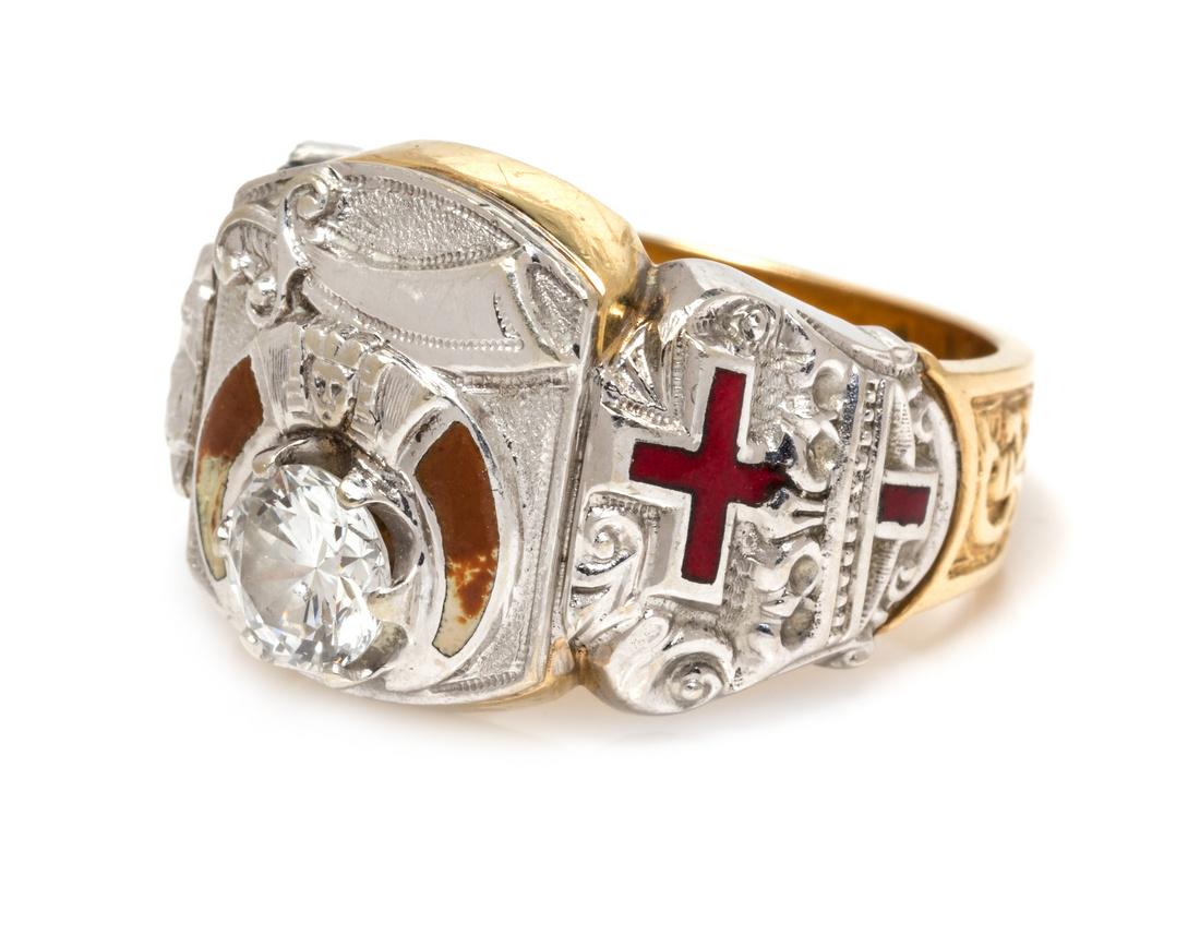 A 14 Karat Bicolor Gold, Diamond, Agate and Polychrome: A 14 Karat Bicolor Gold, Diamond, Agate and Polychrome Enamel Shriner/Mason/Knights Templar Ring, the top having a Shriner emblem containing one round brilliant cut diamond weighing approximately 0.95
