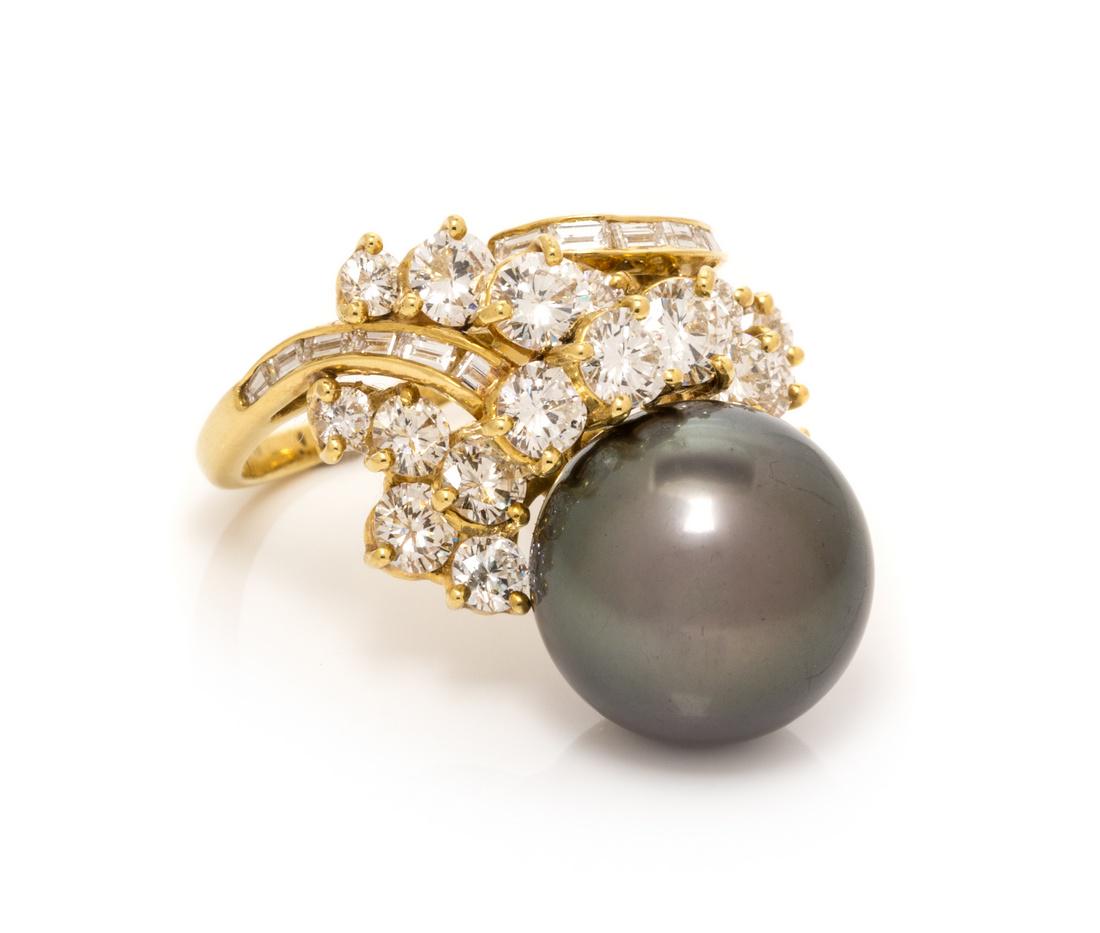 An 18 Karat Yellow Gold, Cultured Tahitian Pearl and (1 of 2)