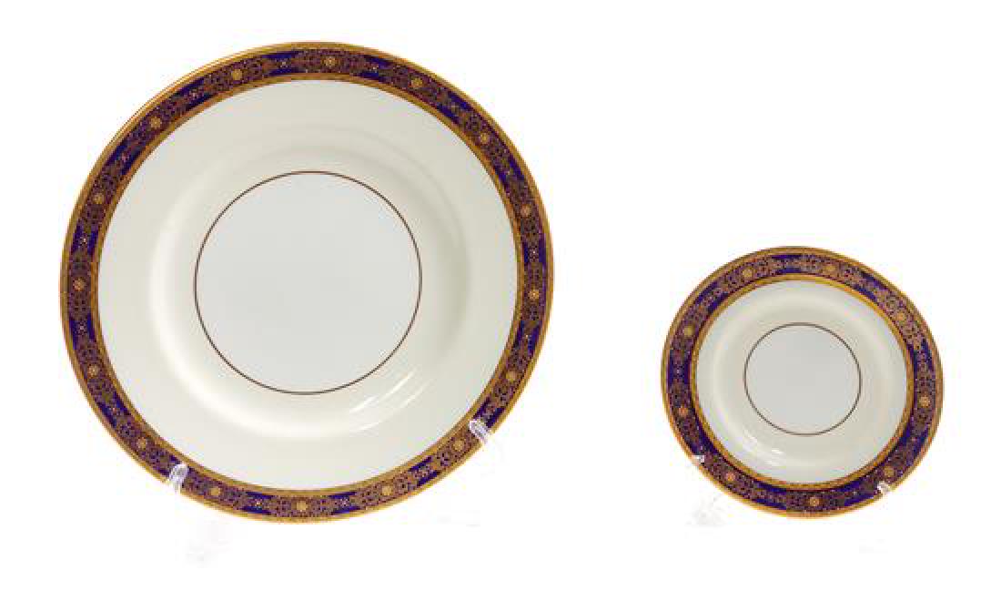 * A Set of English Porcelain Dinner Plates and Saucers (1 of 1)
