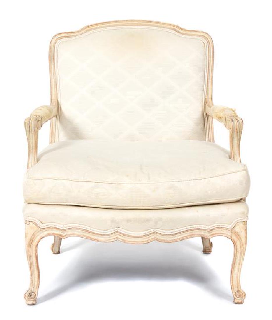 A Louis XV Upholstered Fauteuil Height 34 1/2 inches.: A Louis XV Upholstered Fauteuil 20th century Height 34 1/2 inches. Estimate $80-120 Staining to upholstery, arms in poor condition, minor nicks to edges.