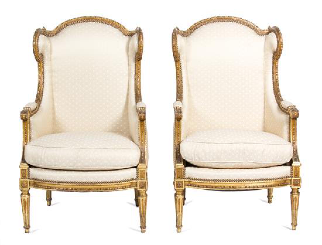A Pair of Louis XVI Style Giltwood Wing Back Chairs (1 of 1)
