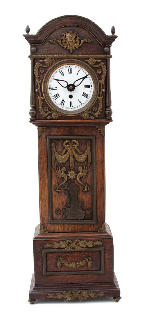 A Gilt Bronze Mounted Oak Miniature Tall Case Clock (1 of 1)