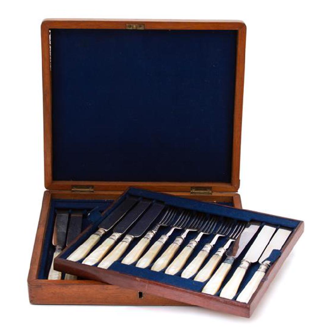 A 24-Piece Silver Plate and Carved Mother of Pearl (1 of 1)