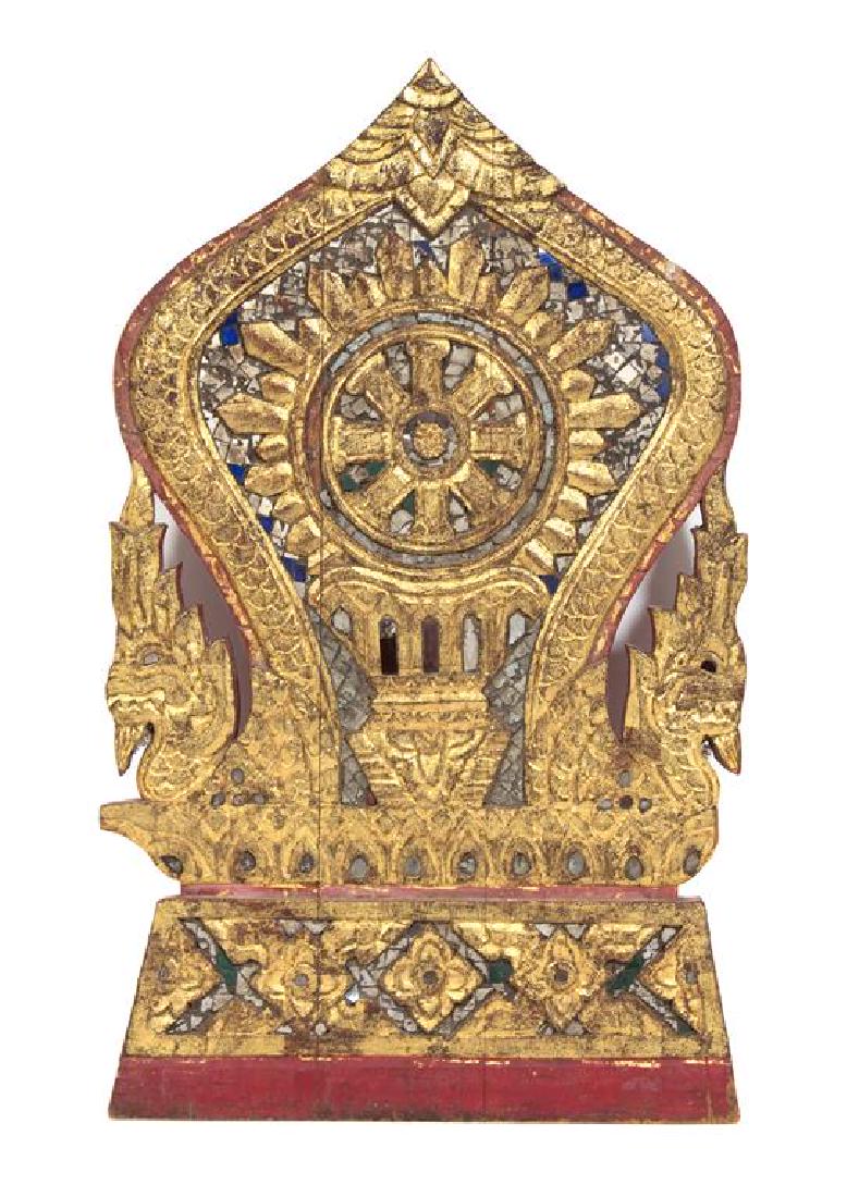An Indian Carved and Gilt Polychrome Temple Fragment: An Indian Carved and Gilt Polychrome Temple Fragment Height 19 inches. Estimate $200-400 Property from H.R.H. Princess Maria Pia of Bourbon-Parma, Palm Beach, FL