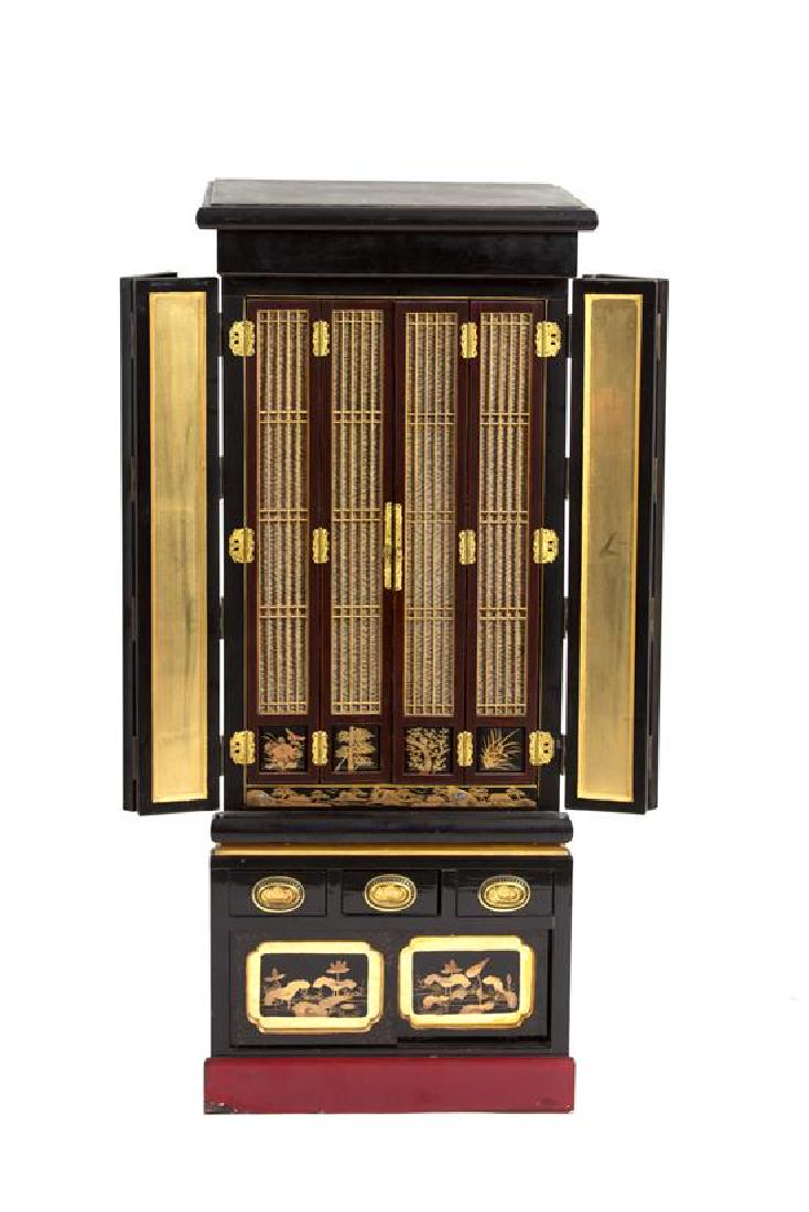 A Japanese Black Lacquered Household Shrine Height 48: A Japanese Black Lacquered Household Shrine 19th century Height 48 1/2 x width 19 x depth 6 inches. Estimate $150-250 Top surface unfinished, minor nicks to edges and at base.