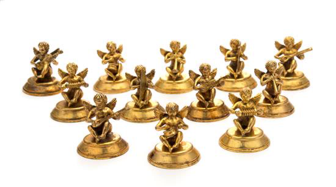 A Set of Twelve Italian Silver-Gilt Placecard Holders, (1 of 2)
