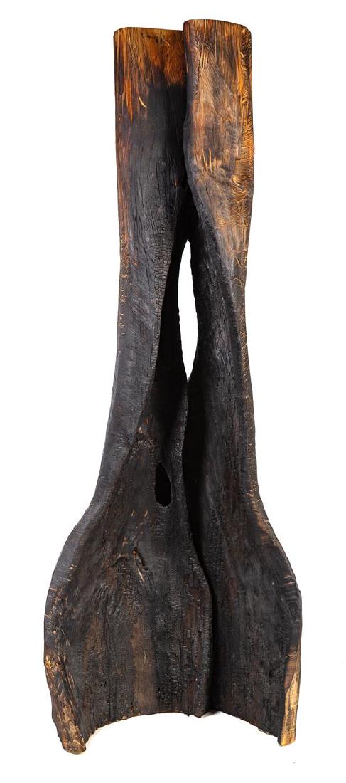 * David Nash, (British, b. 1945), Twister Column, 1998: * David Nash (British, b. 1945) Twister Column, 1998 charred redwood trunk Height 86 x width 31 x depth 31 inches. Estimate $10,000-15,000 Provenance: Haines Gallery, San Francisco
