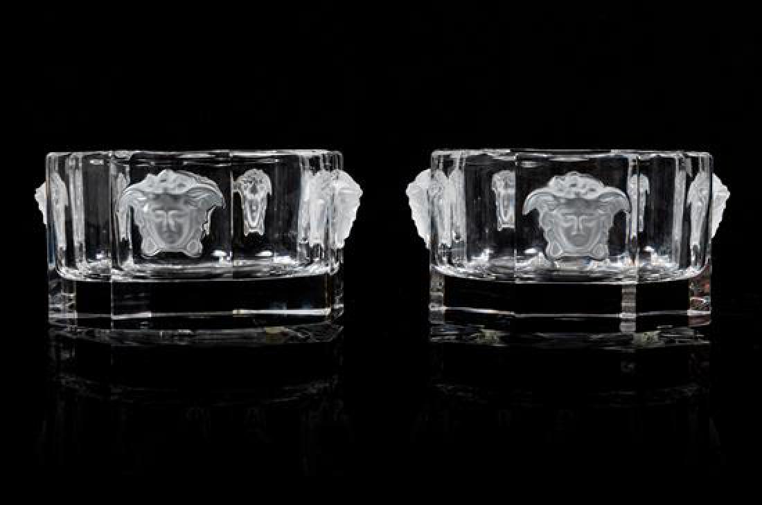 * A Pair of Versace for Rosenthal Molded and Frosted: * A Pair of Versace for Rosenthal Molded and Frosted Glass Wine Coasters 20th century each of octagonal form with four raised Medusa masks, with a Rosenthal Versace acid stamp to the underside. Width