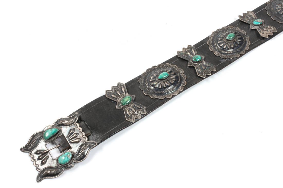 Navajo Turquoise and Silver Concho Belt Length 43: Navajo Turquoise and Silver Concho Belt Length 43 inches Estimate $300-500 Property from the Estate of Judge Thomas and Betty Phelps