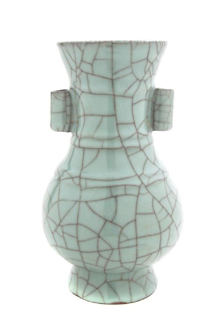 * A Guan- Type Porcelain Vase Height 10 1/4 inches.: * A Guan- Type Porcelain Vase Height 10 1/4 inches. Estimate $100-200 Property from the Estate of Mr. Gerald Torrence, Homewood, Illinois