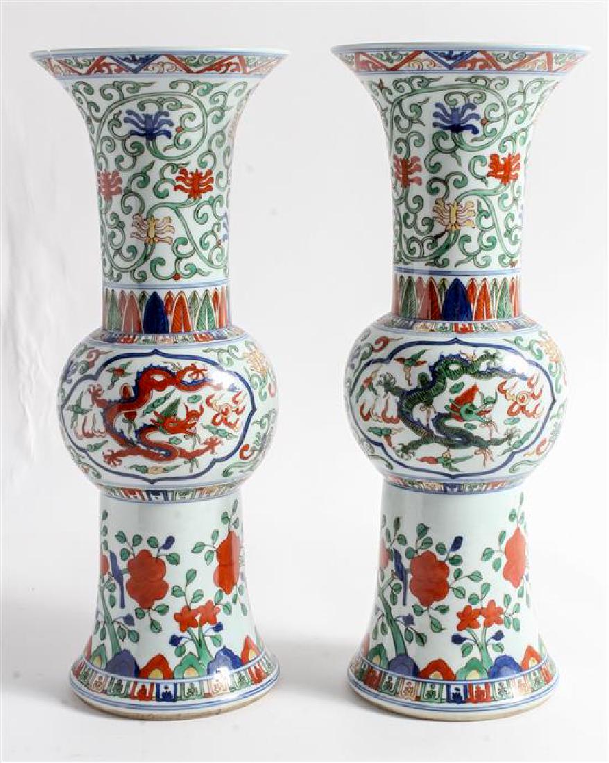 * A Pair of Wucai Porcelain Beaker Vases Height 15 1/2: * A Pair of Wucai Porcelain Beaker Vases Height 15 1/2 inches. Estimate $150-250 Property from the Estate of Mr. Gerald Torrence, Homewood, Illinois