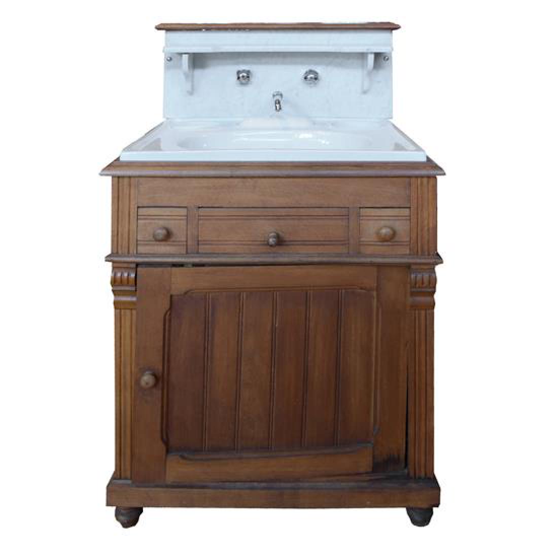 A Wood and Marble Wash Stand/Commode 27" W x 25" D x: A Wood and Marble Wash Stand/Commode france 27" W x 25" D x 44" H Estimate $600-800