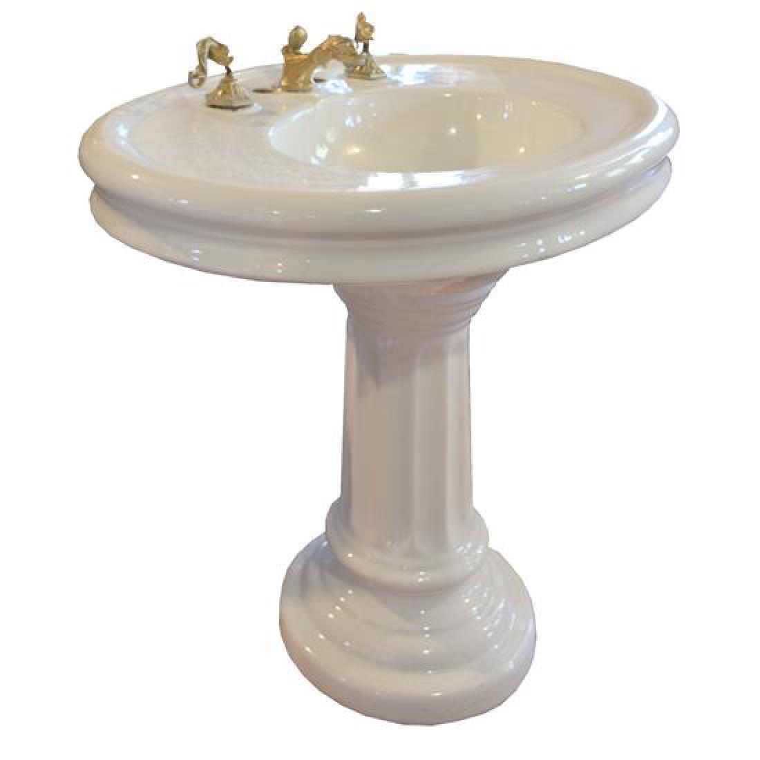 A Porcelain Pedestal Sink with Aquatic Hardware 37.5" W: A Porcelain Pedestal Sink with Aquatic Hardware united states, 20th century 37.5" W x 27.5" D x 32" H Estimate $500-700