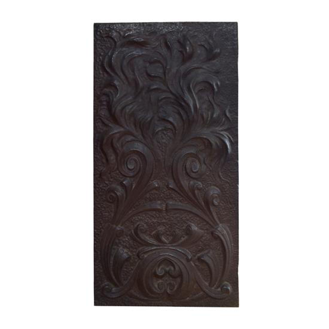 A Cast Iron Fireback 14.5" W x .25" D x 29.5" H: A Cast Iron Fireback united states, circa 1880 14.5" W x .25" D x 29.5" H Estimate $100-200