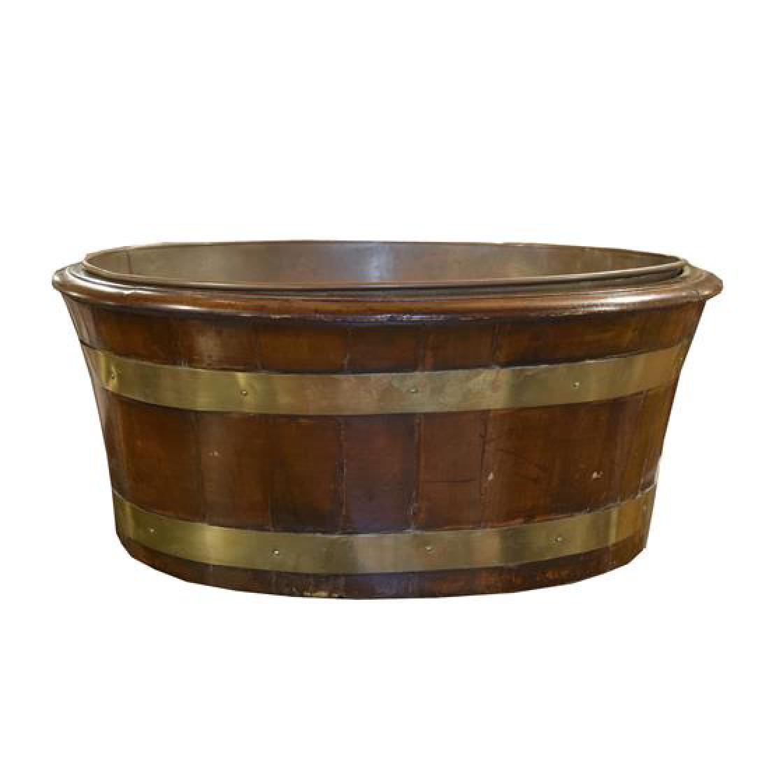 A Brass Banded Mahogany Cellarette 27" W x 21.5" D x: A Brass Banded Mahogany Cellarette england, 19th century 27" W x 21.5" D x 11.5" H Estimate $500-700