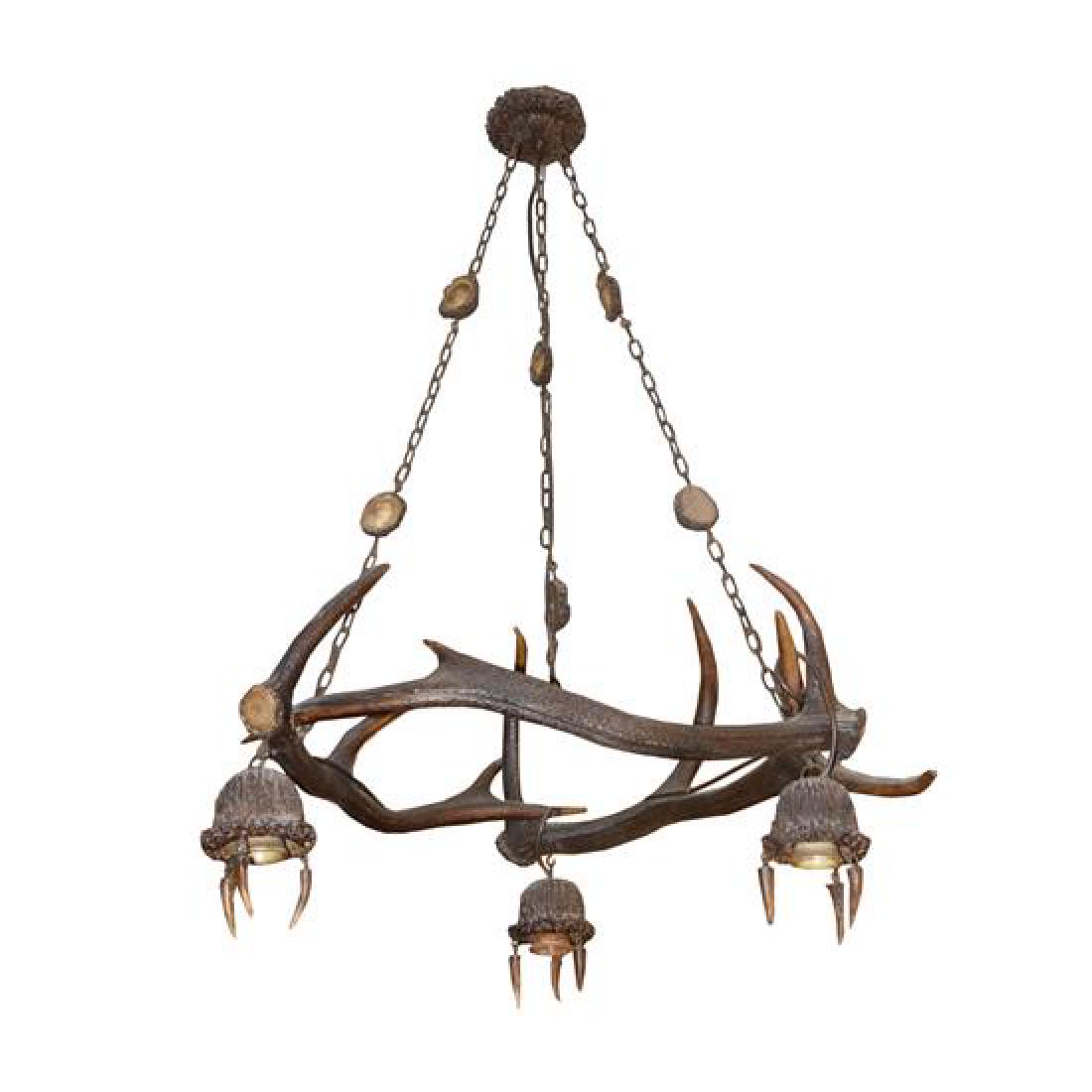An Antler Chandelier from a Bavarian Hunting Lodge 20": An Antler Chandelier from a Bavarian Hunting Lodge germany, 19th century 20" W x 22" D x 32" H Estimate $800-1,200