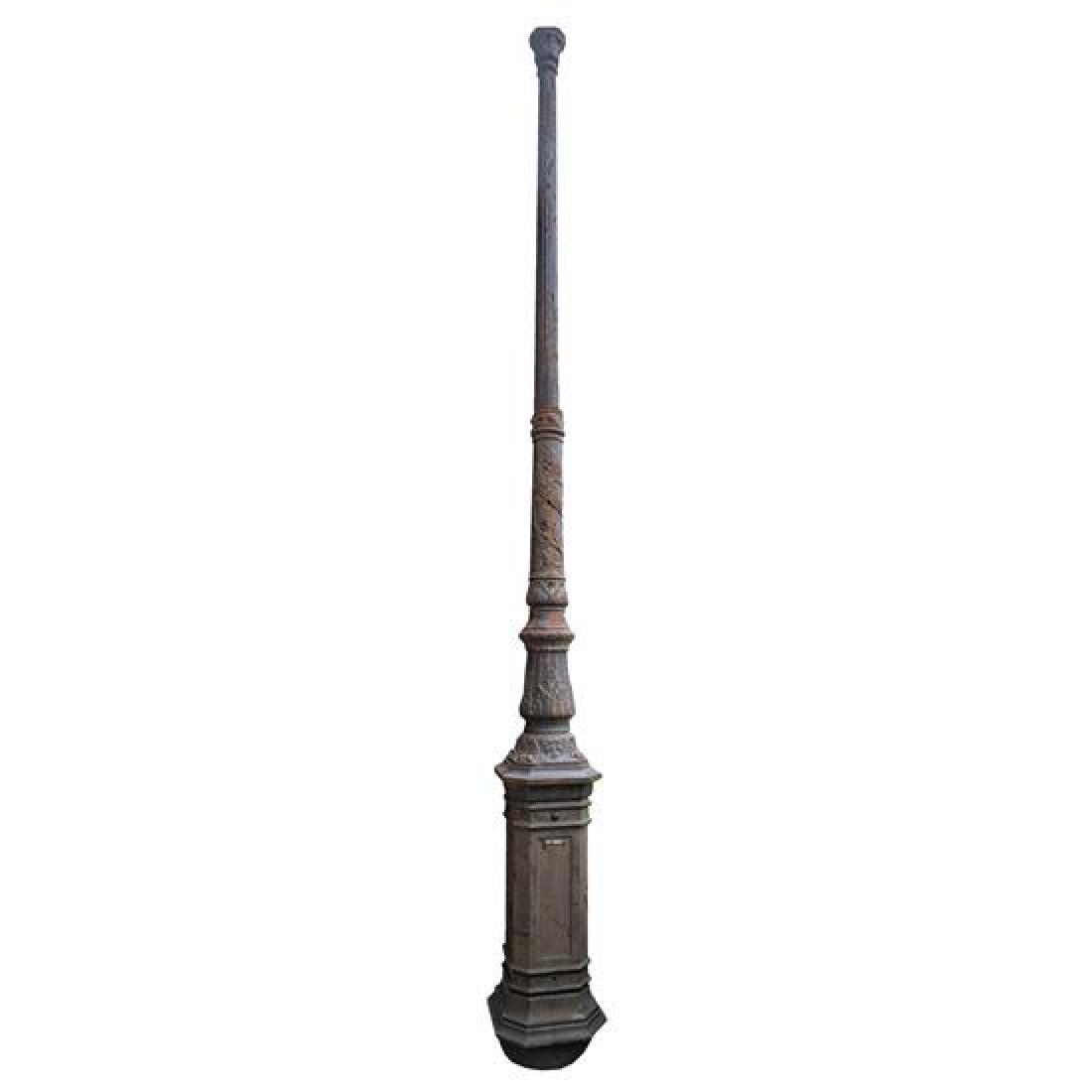 An Iron Lamp Post 17" W x 17" D x ~200" H (1 of 3)