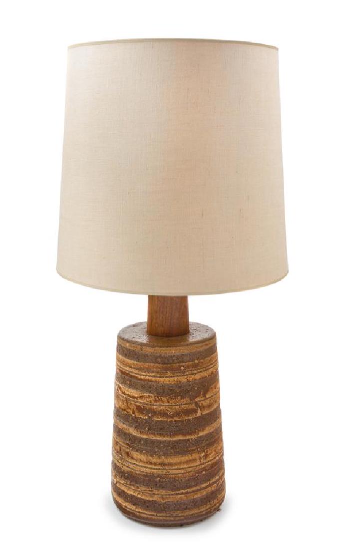 Gordon and Jane Martz, (American, 1924-2015 |: Gordon and Jane Martz (American, 1924-2015 | 1929-2007) Marshall Studios, c. 1950s table lamp with original shade glazed stoneware, walnut, fabric partial manufacturer's paper label Height 35 1/2 x di