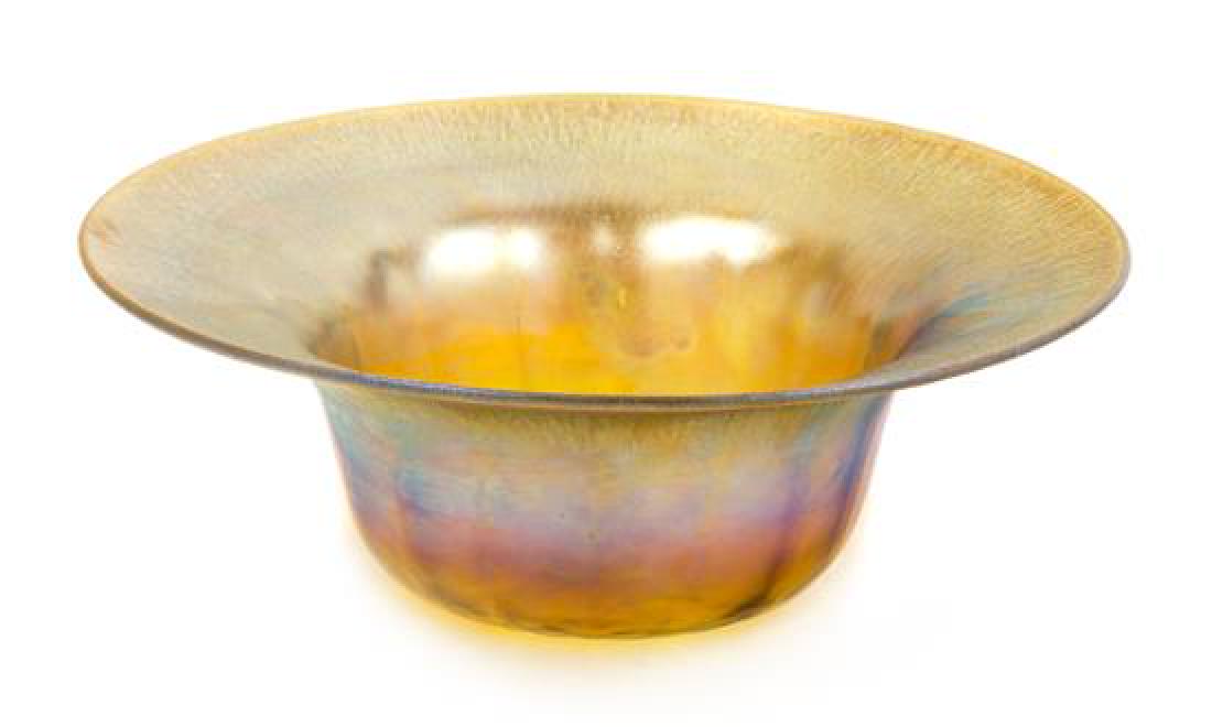 * Tiffany Studios, American, Early 20th Century, bowl: * Tiffany Studios American, Early 20th Century bowl Favrile glass etched L.C. Tiffany/Favrile/1925 Diameter 10 1/4 inches Estimate $500-700 Property from the Estate of Anita Quanbeck, Watertown, Wisco