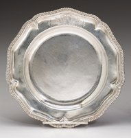 George III sterling silver salver, john parker &: George III sterling silver salver john parker & edward wakelin, london, 1768 Having a shaped gadrooned border bearing an armorial crest, the reverse inscribed 'No. 83, 18-12'. Diam: 9 1/2 in. 17 oz.